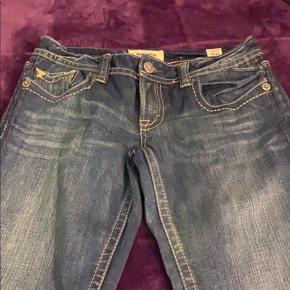 There MEK jeans never worn tags are removed .